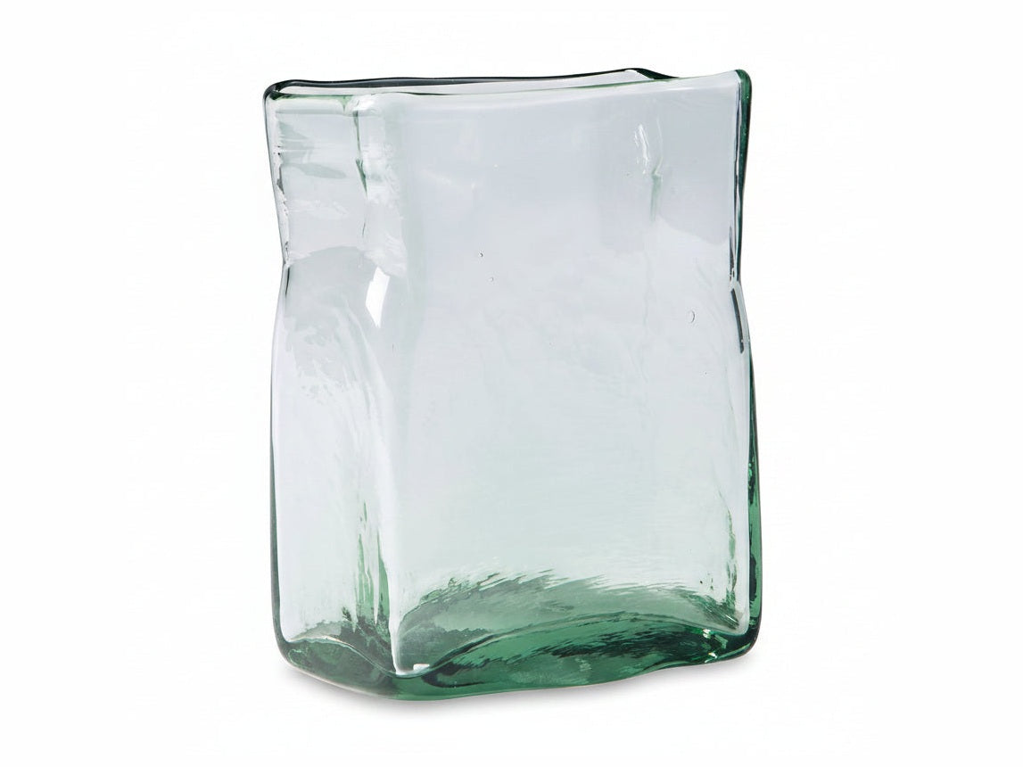 The Taylow clear glass vase with a wavy design on a white background.