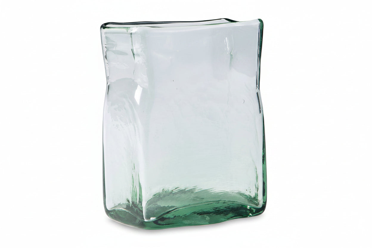 The Taylow clear glass vase with a wavy design on a white background.