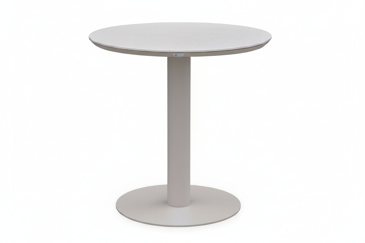 Round white table on a white background