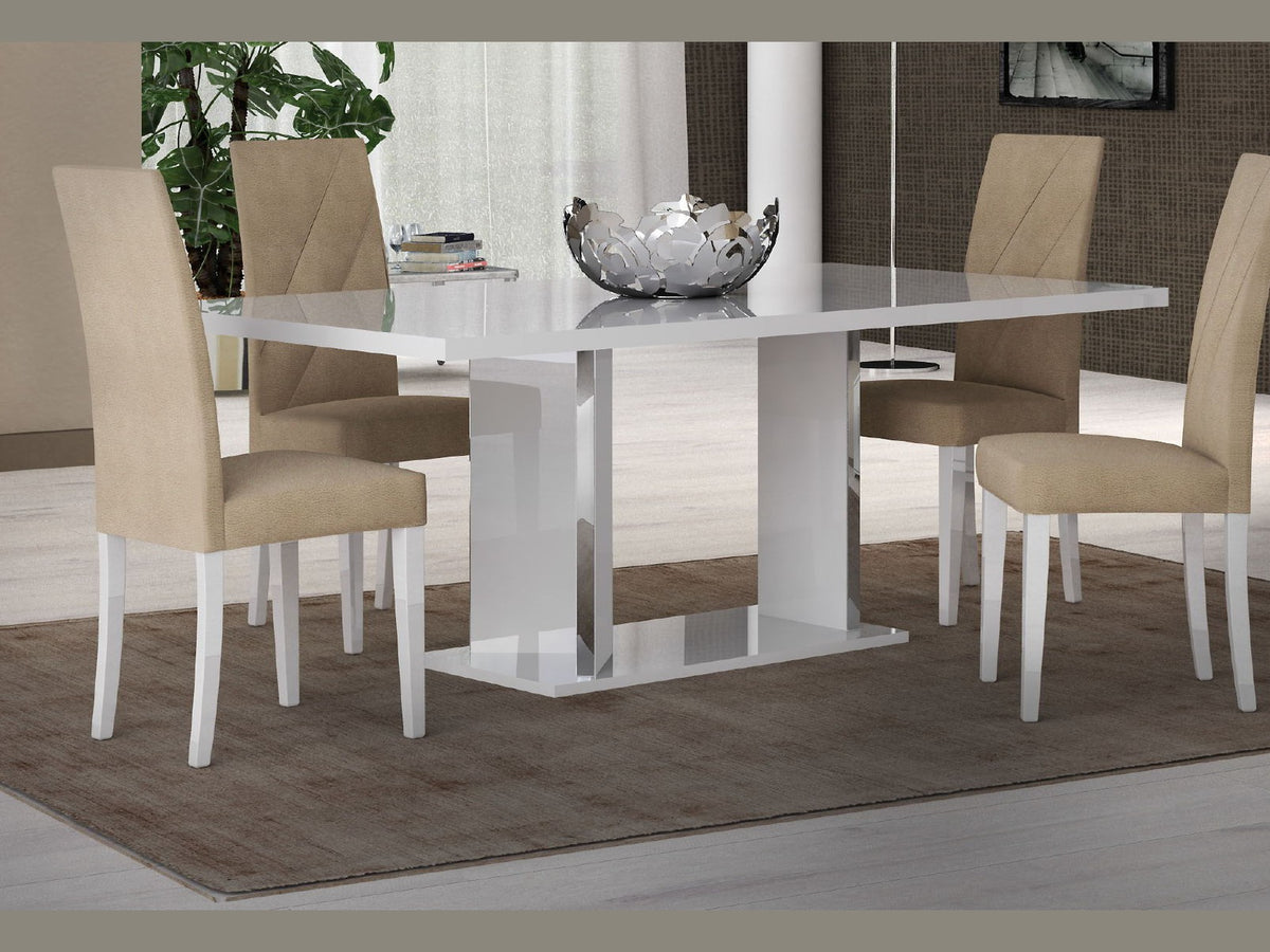 A modern 5-piece dining set featuring a glossy white rectangular table and four beige upholstered chairs with white legs, arranged on a brown rug in a contemporary dining room setting.