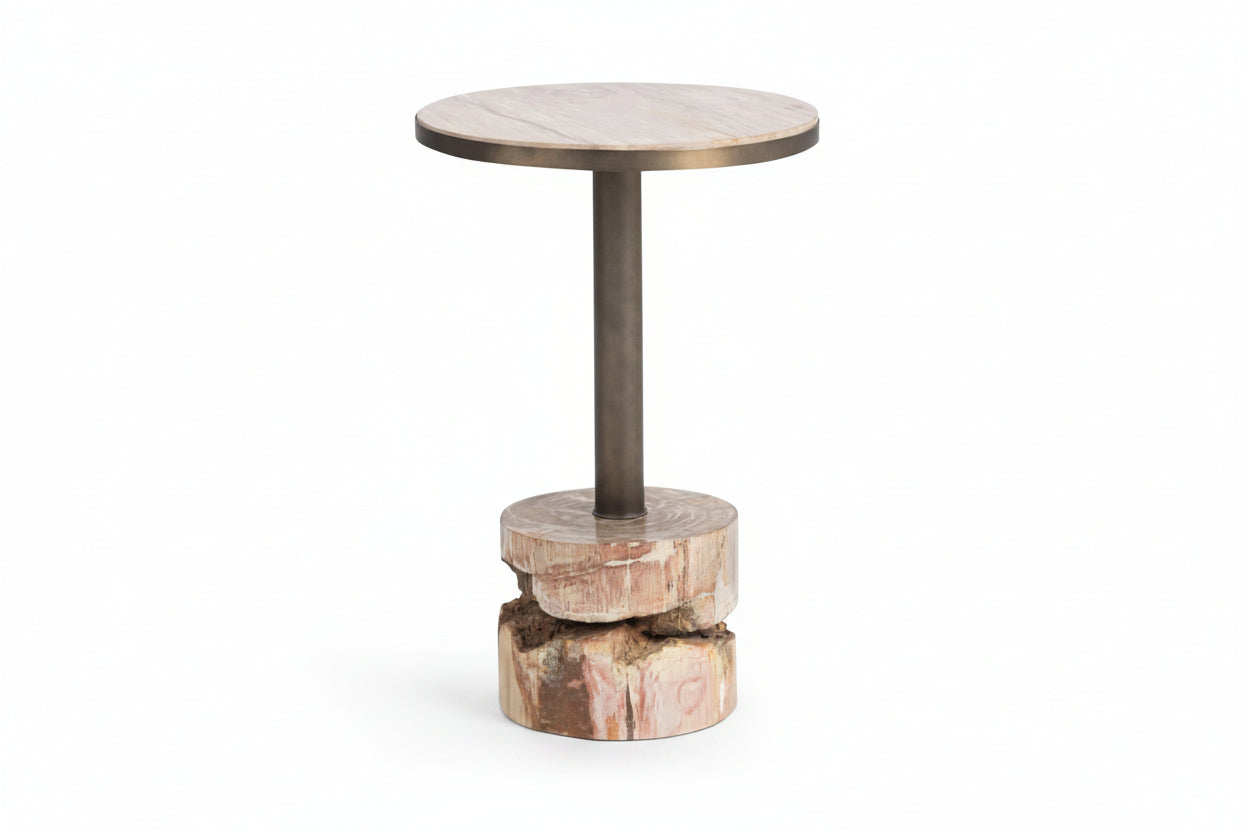Round side table with marble top and stone base on a white background