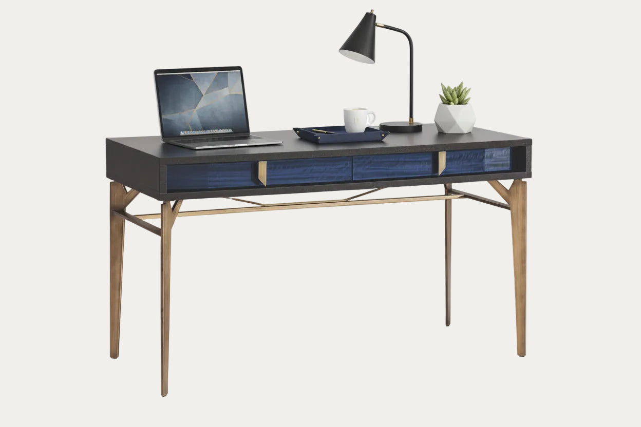 Oceanum modern vanity with dark surface and wooden legs on a white background.