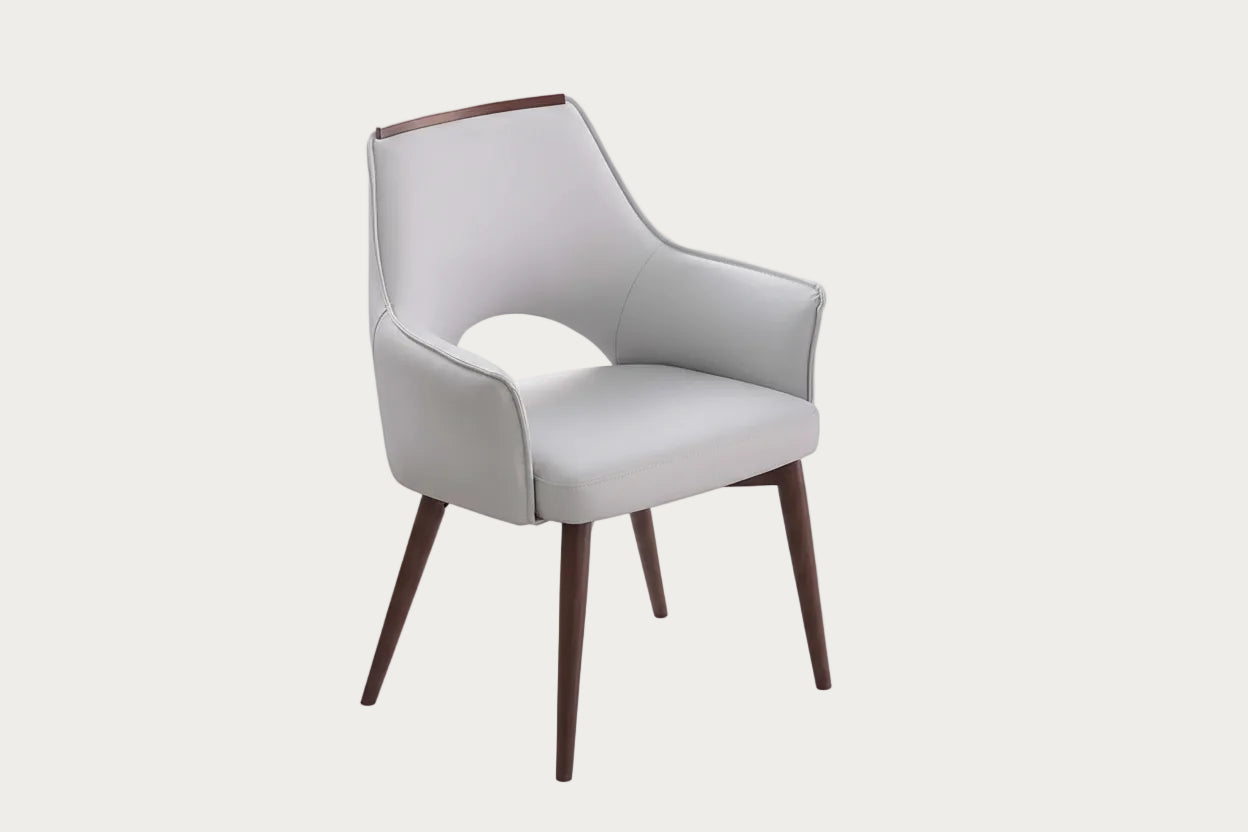 Devan gray armchair with wooden legs on a white background