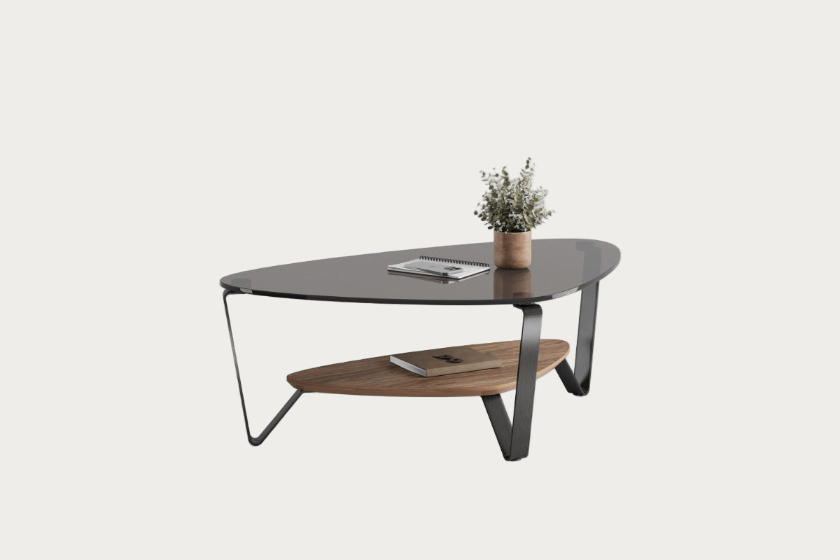 Modern coffee table with a glass top and wooden shelf on a white background