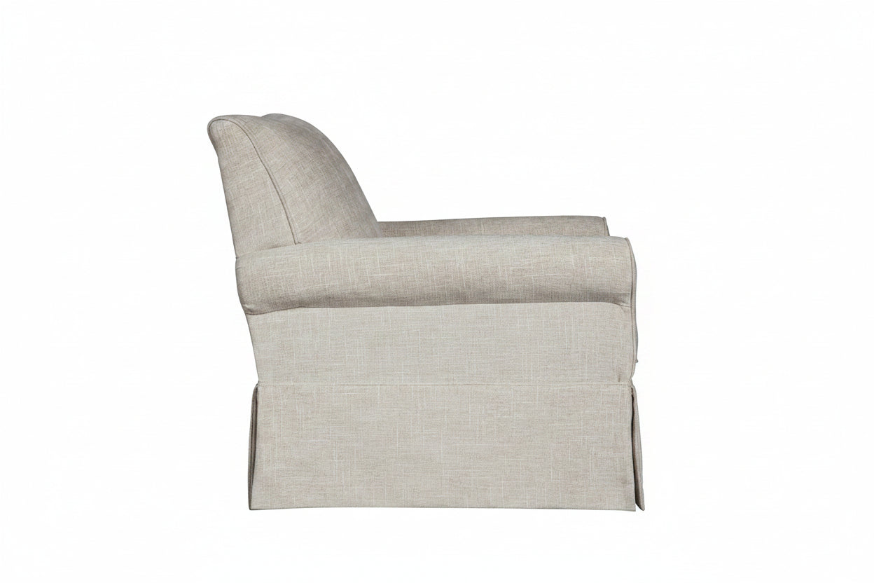 Beige upholstered chair on a white background