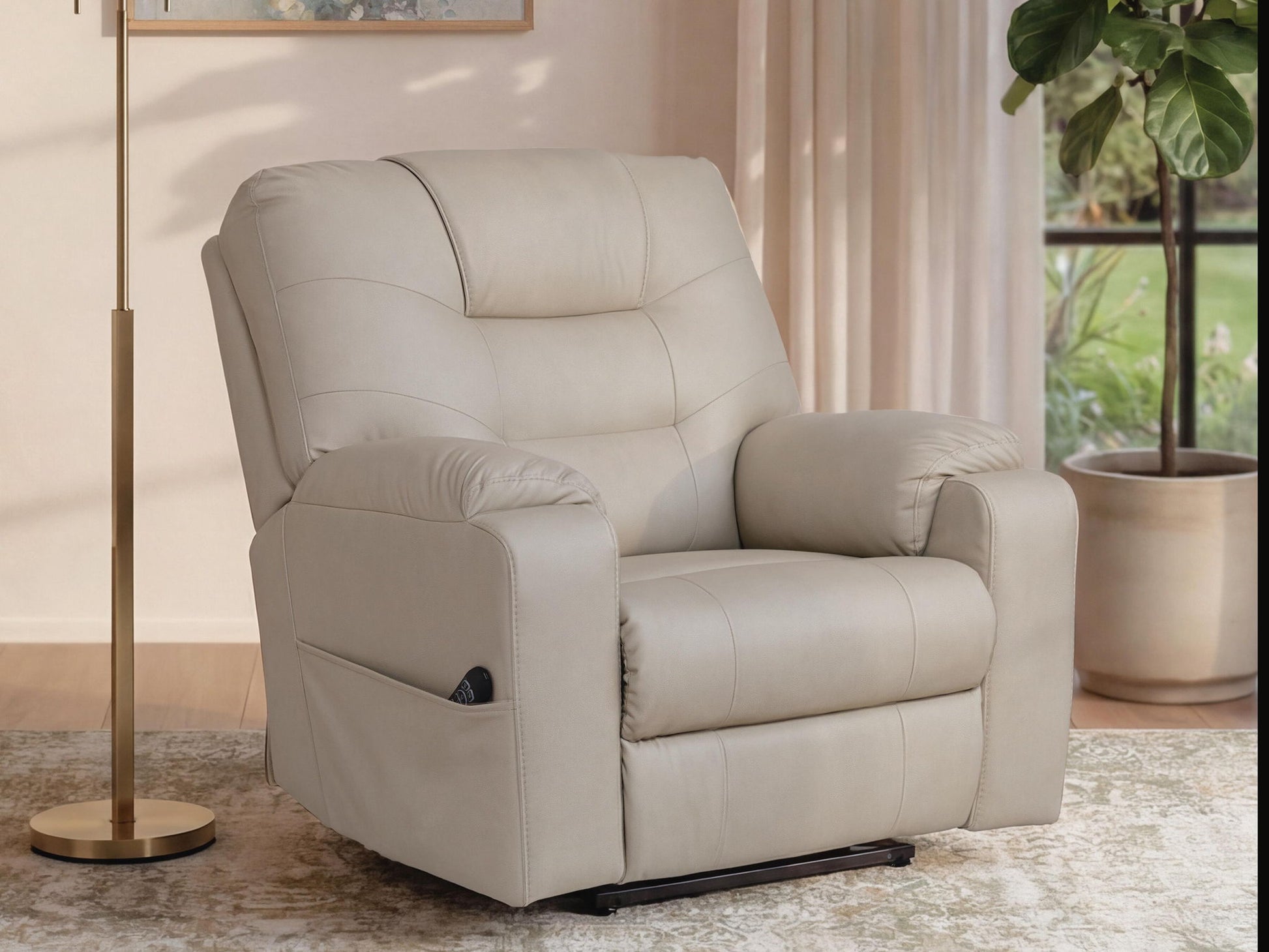 Beige recliner chair in a living room setting with a plant and lamp.
