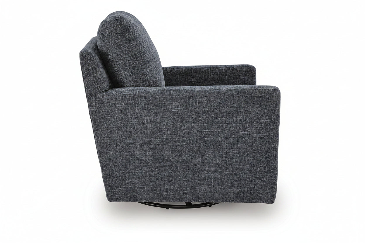 A dark gray textured fabric swivel armchair with a black circular base, shown from a side angle against a white background.