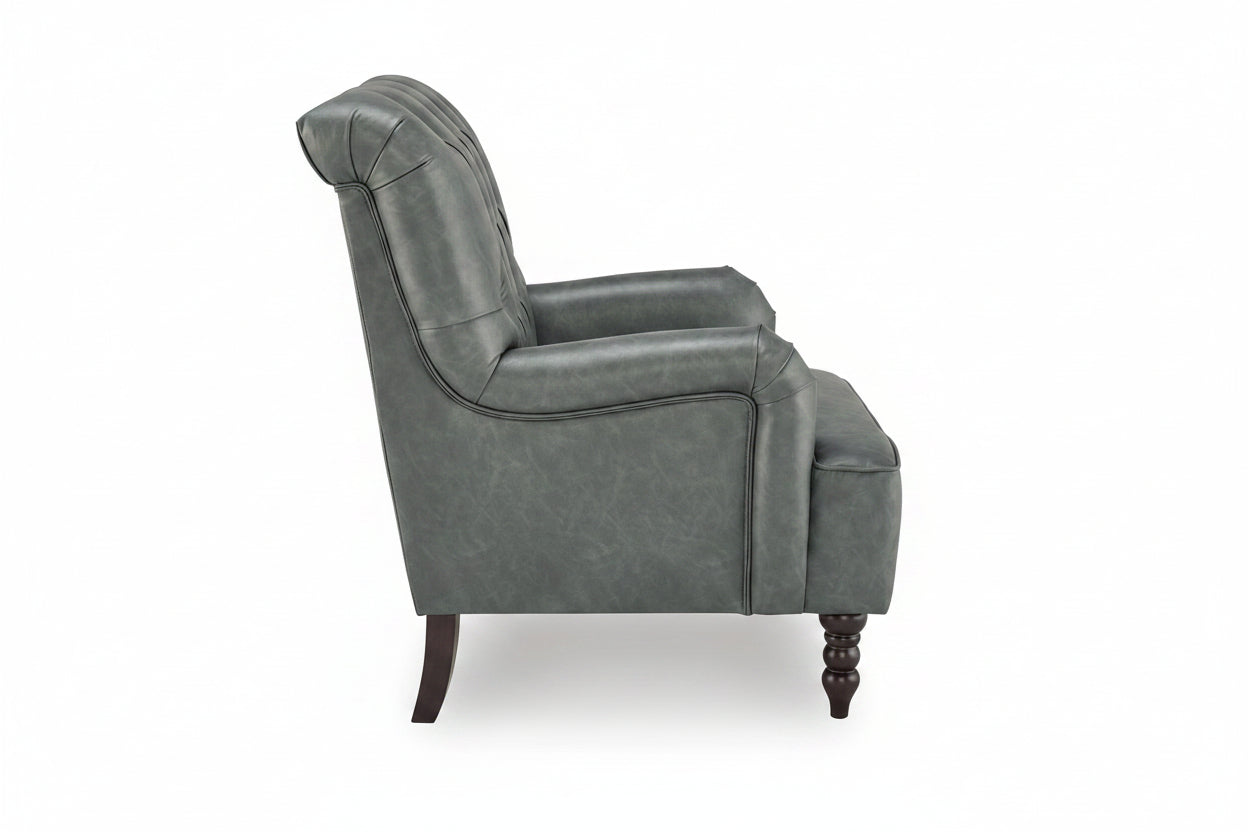 A classic wingback armchair upholstered in textured gray faux leather, featuring dark brown turned wooden legs, shown from a three-quarters angle against a white background.