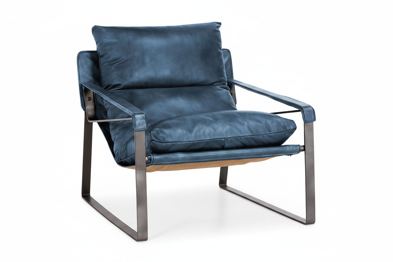 Blue leather armchair with metal frame on a white background