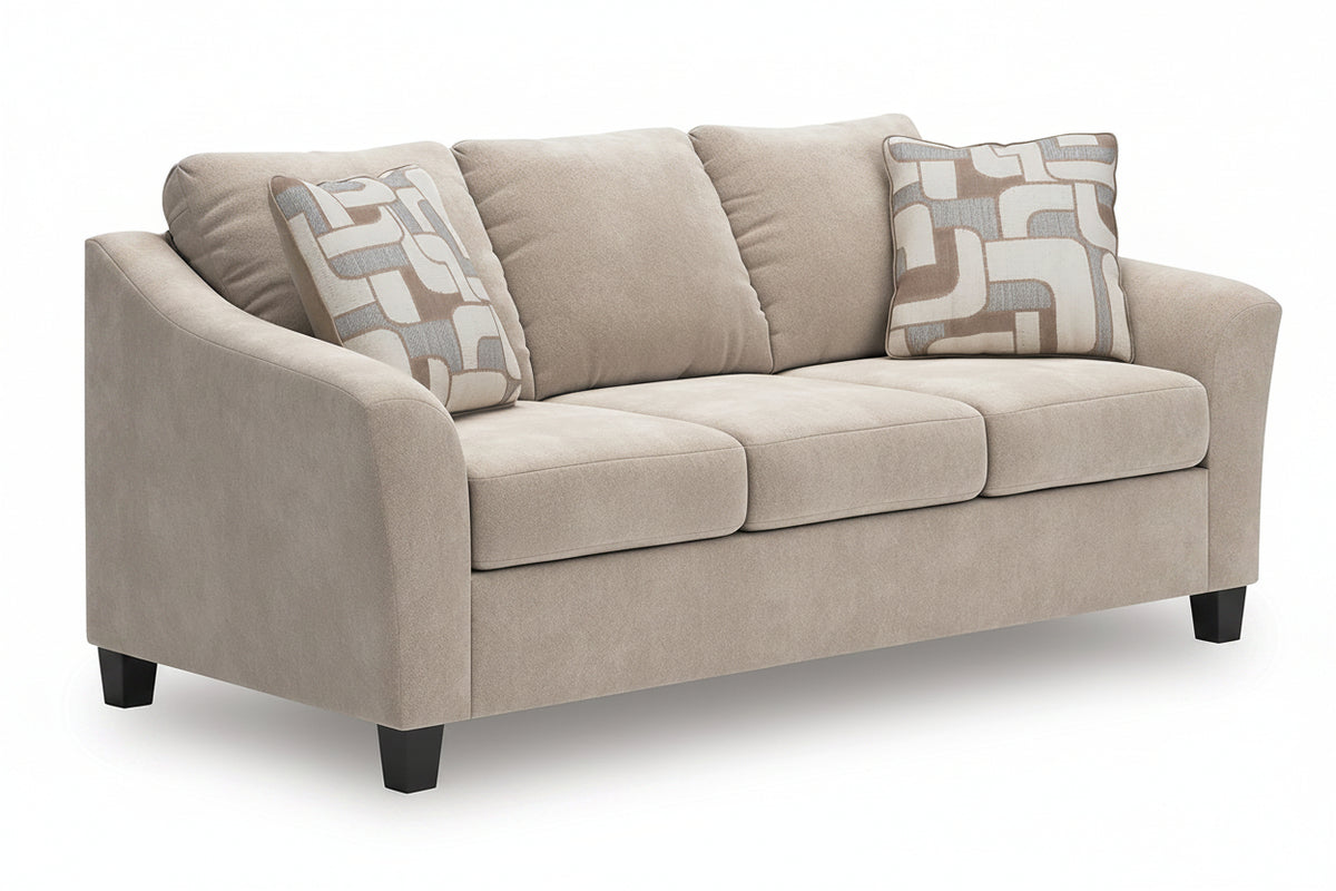 A three-seat loveseat sofa upholstered in a warm beige textured fabric, featuring two decorative throw pillows with a beige, gray, and white geometric pattern, set against a plain white background.