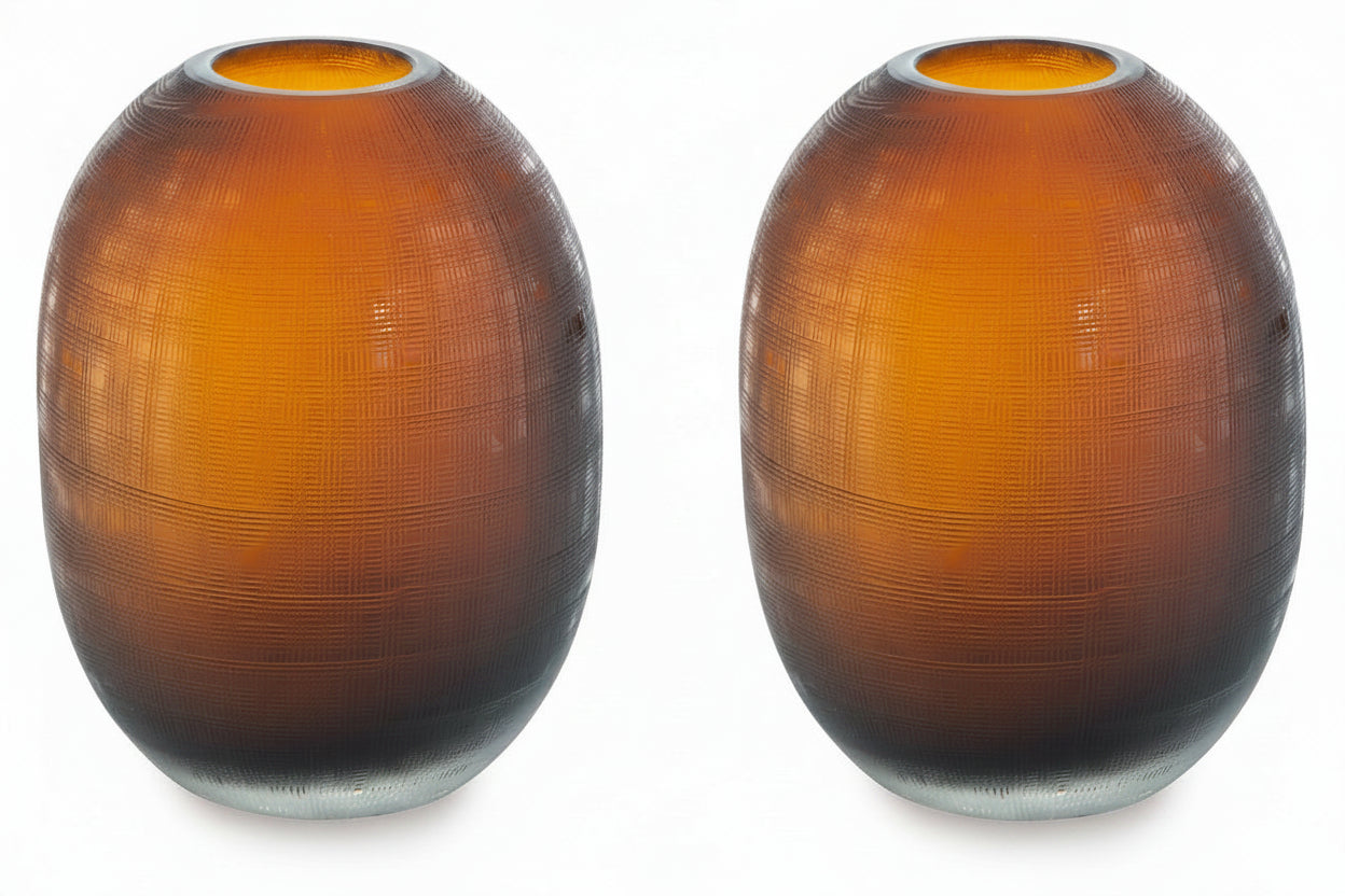 Two amber-colored glass vases with textured surface on a white background