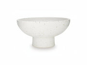 White ceramic bowl with speckled texture on a white background