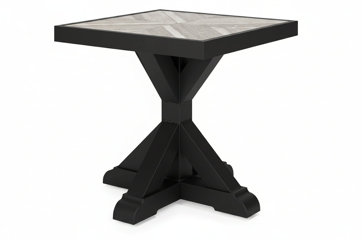 Black square table with tiled top on a white background