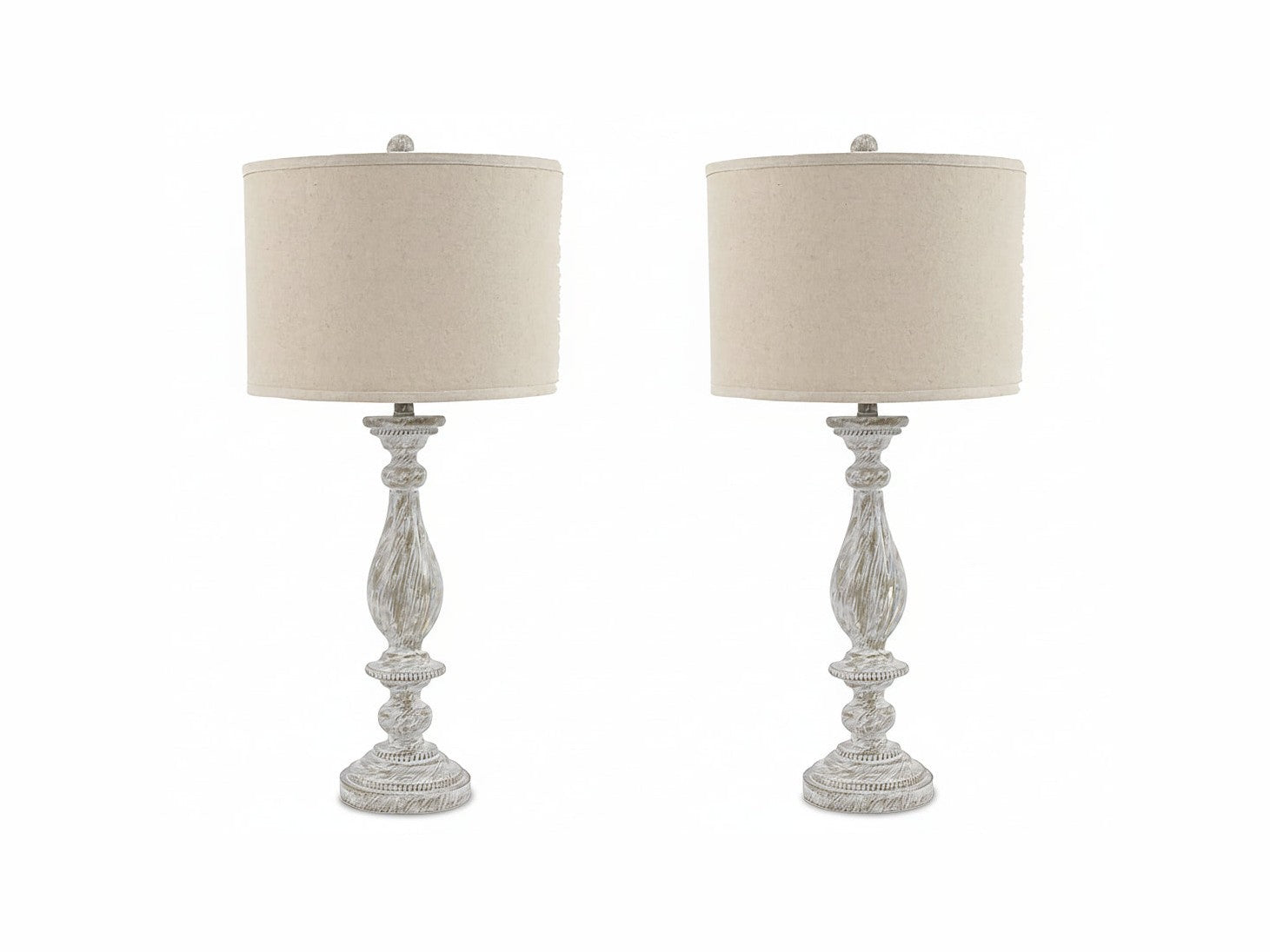 Two Bernadate table lamps with decorative bases and beige lampshades on a white background.