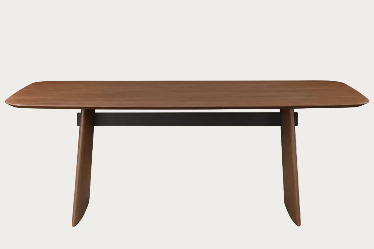 Wooden dining table on a white background