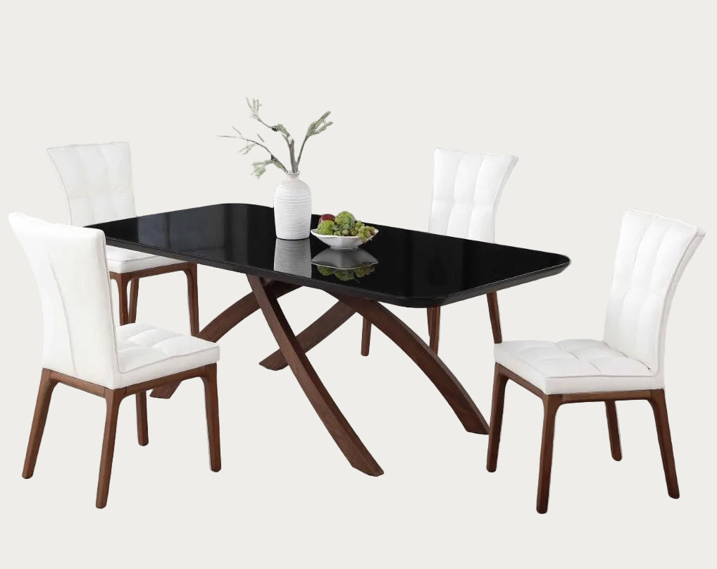 Emily dining room with a black glass table and white chairs in a modern interior setting.