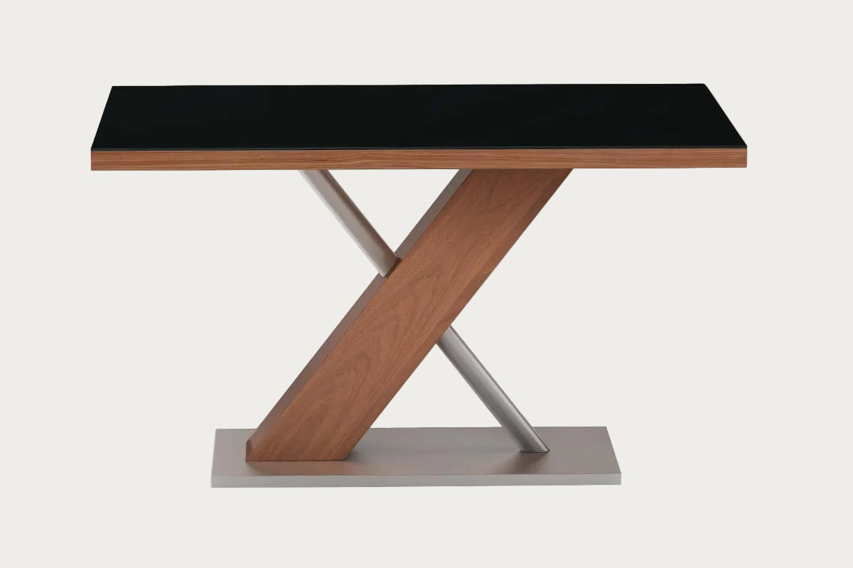 Emma modern dining table with black top and wooden legs on a white background