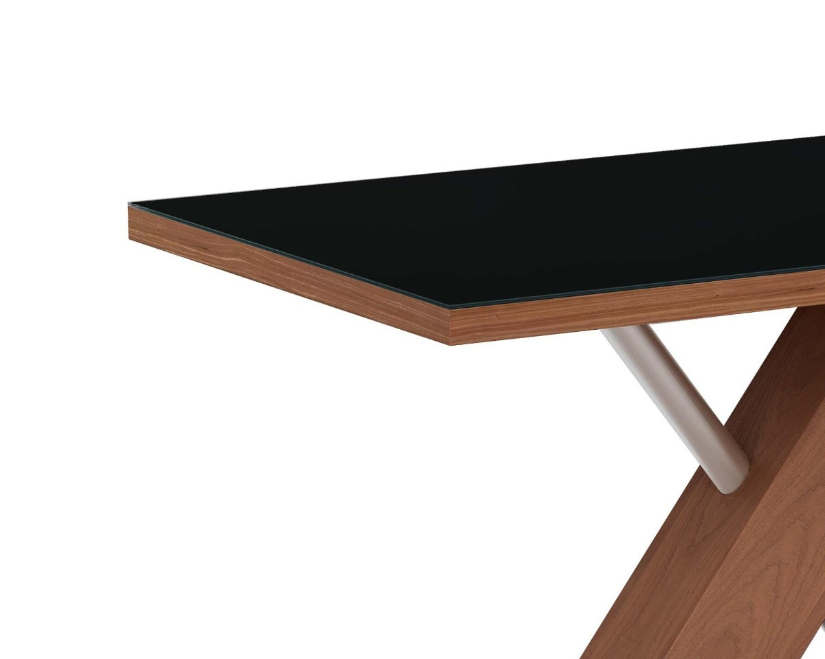 Emma black table top with wooden frame and white legs on a white background