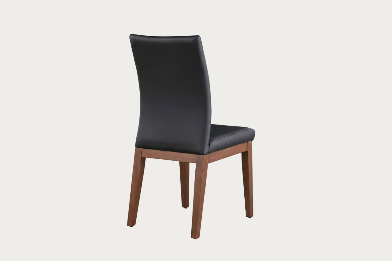 Emma black leather chair with wooden legs on a white background