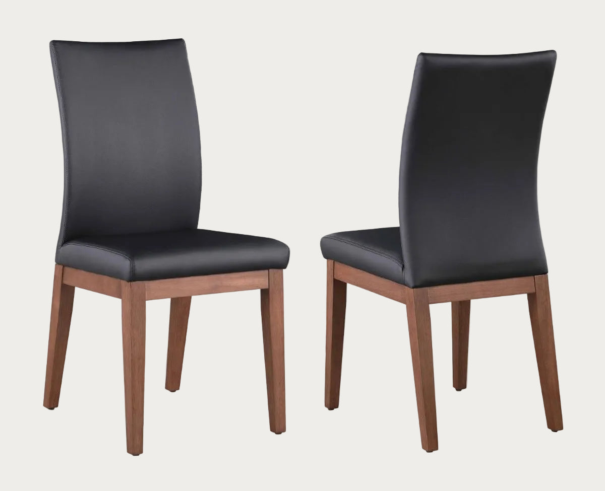 Emma wwo black leather chairs with wooden legs on a white background