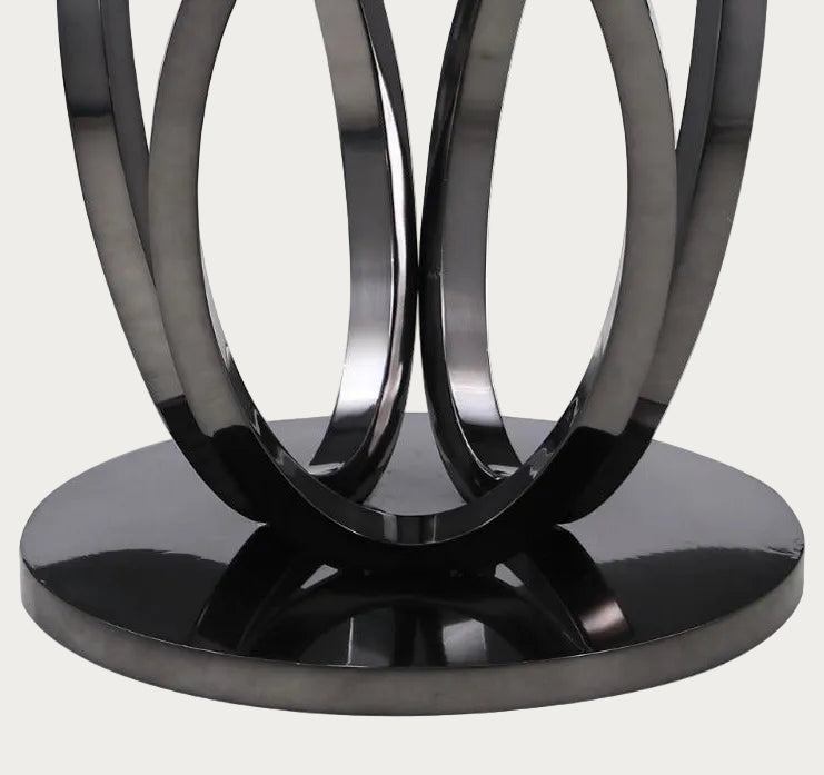 Evelyn black metal base with interlocking rings on a white background