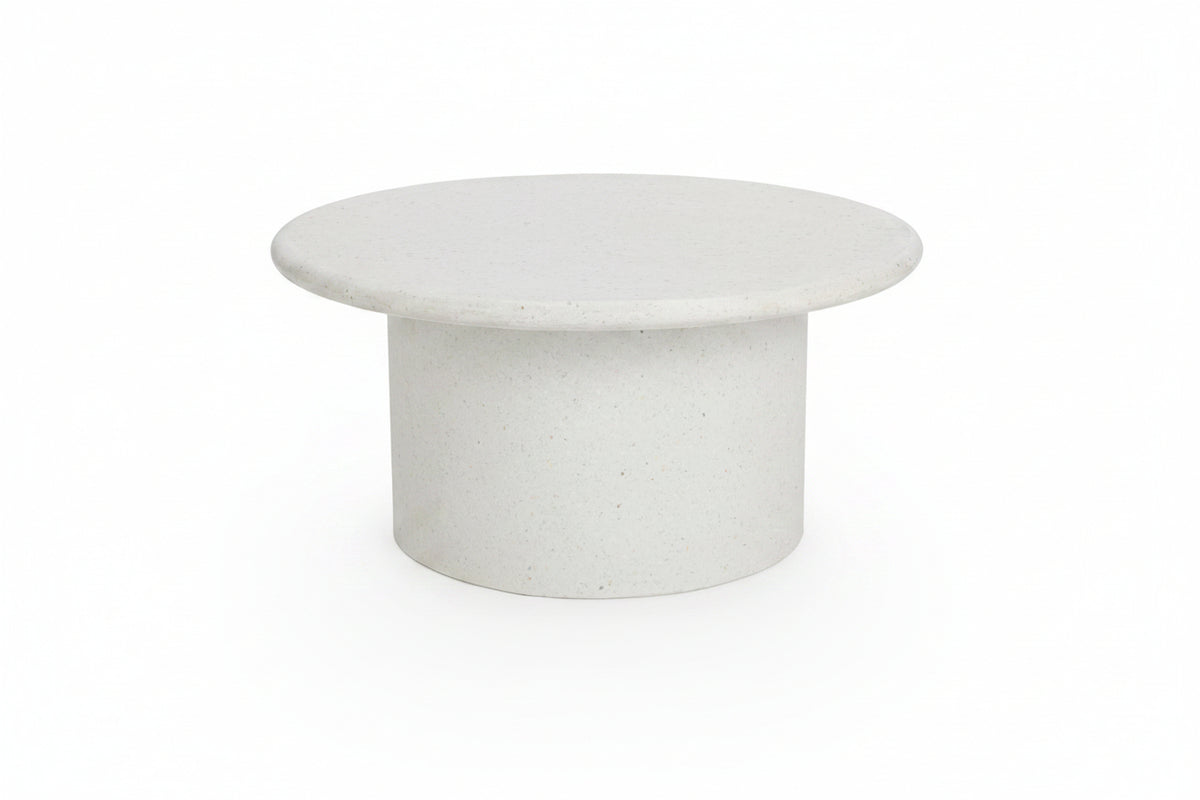 Round concrete coffee table on a white background