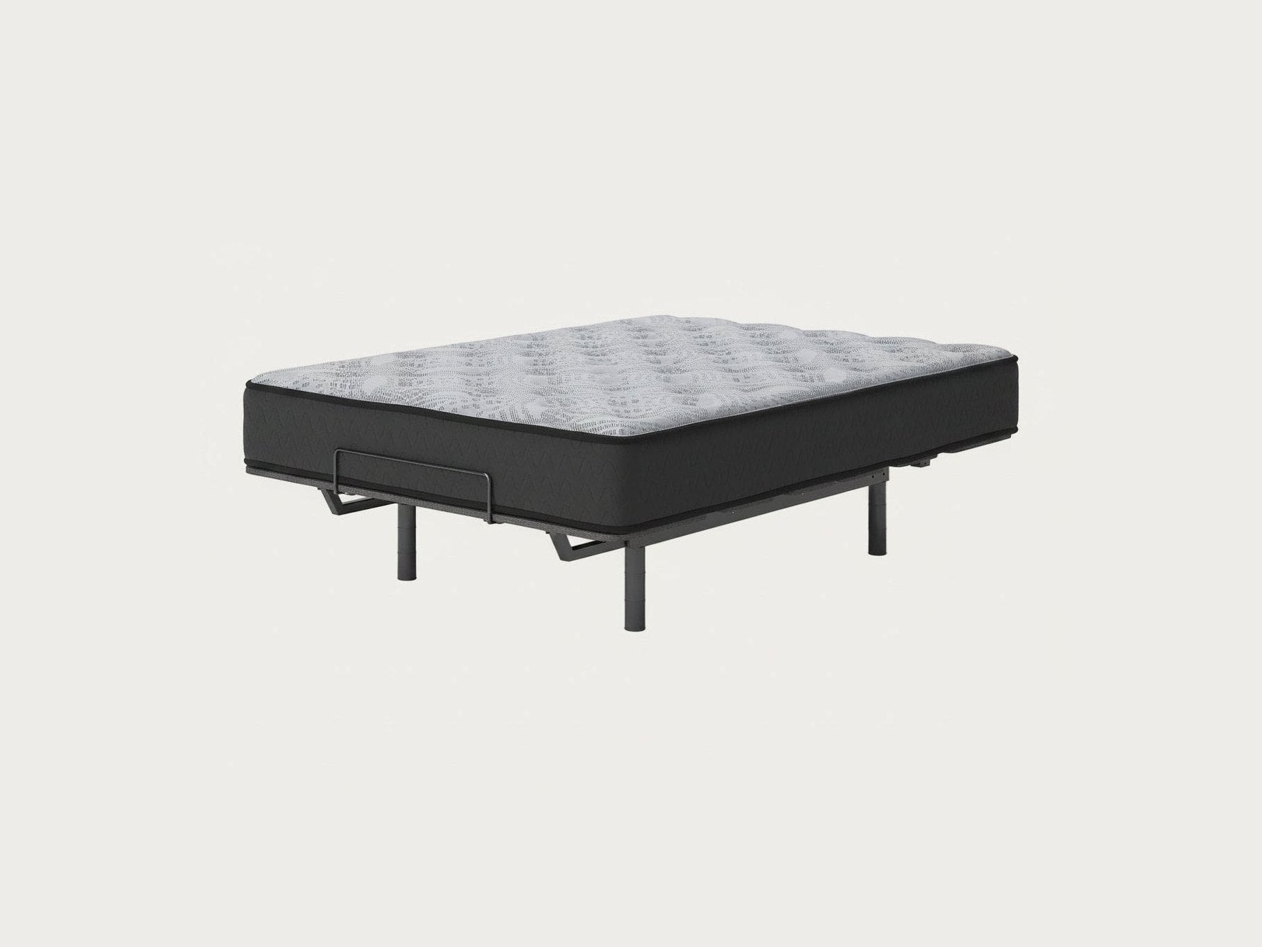 Mattress on a black frame with visible springs on a white background