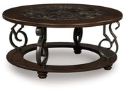Frallyn - Round Cocktail Table - Dark Brown