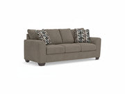 Brown sofa with patterned cushions on a white background