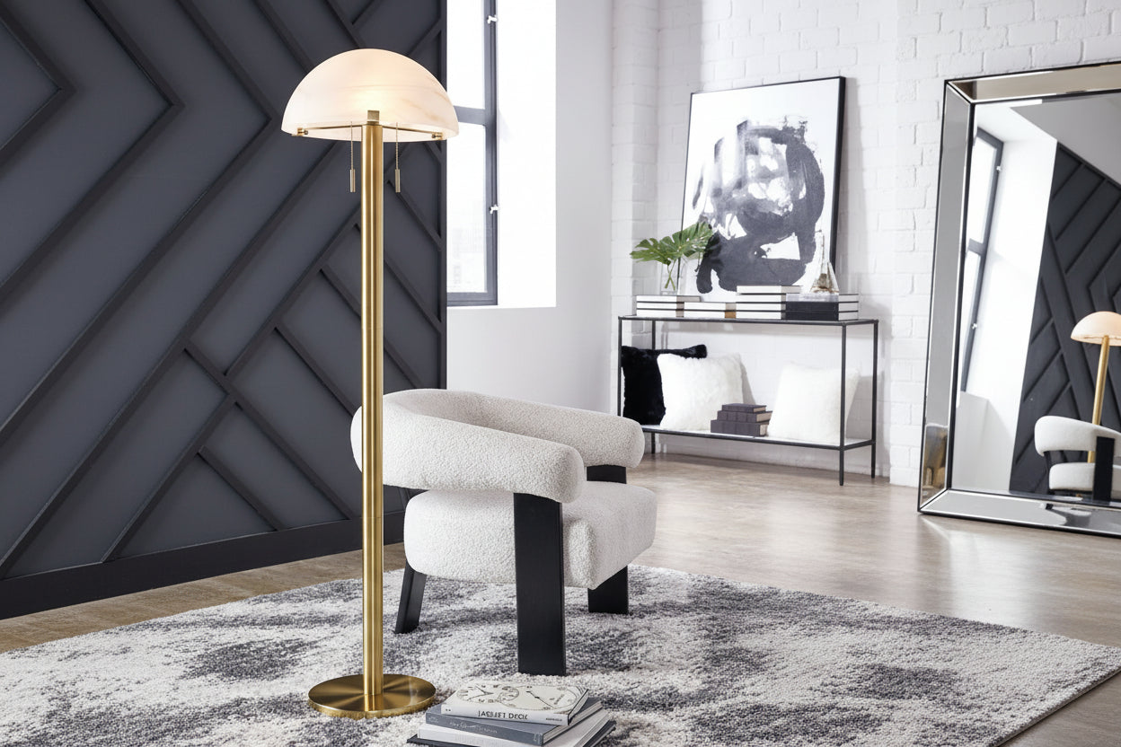 Tobbinsen floor lamp in a modern living room setting with a chair and decor.