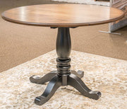 Clorazi - Round Dining Room Drop Leaf Table - Black / Brown