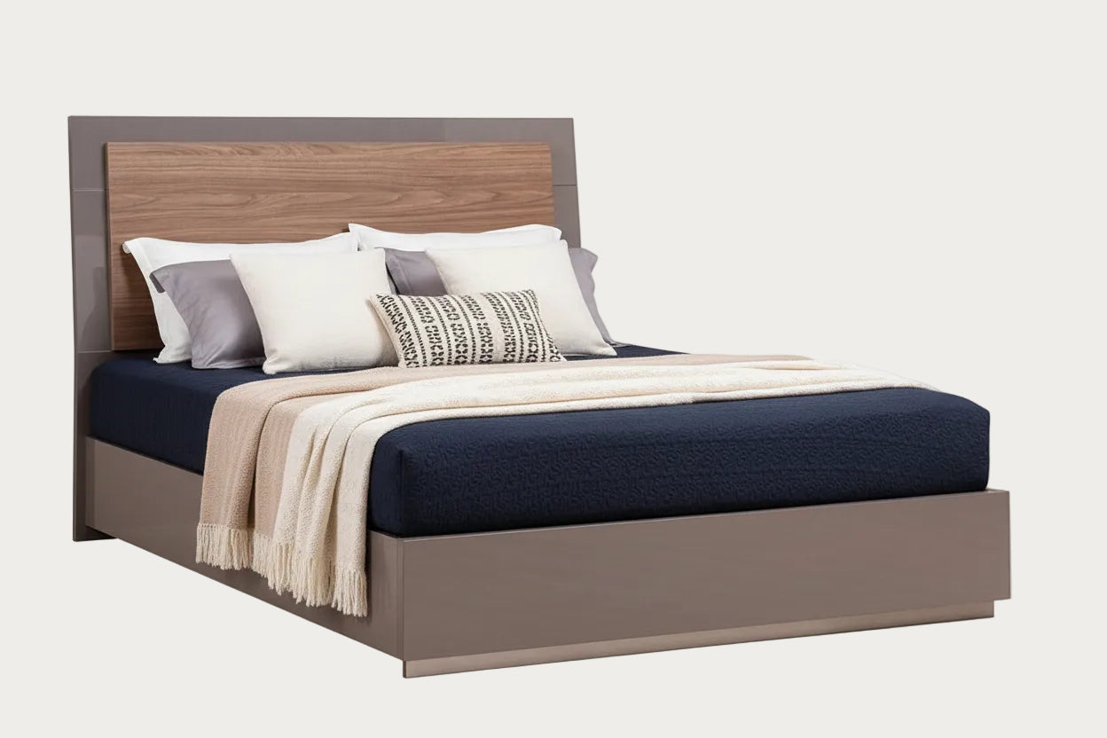 Fifth Avenue bed with wooden headboard and bedding on a white background
