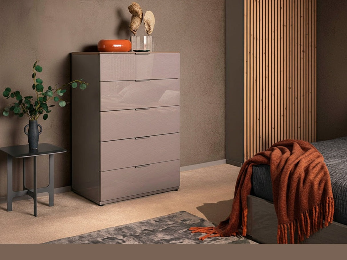 Fifth Avenue gray dresser with decorative items against a neutral wall