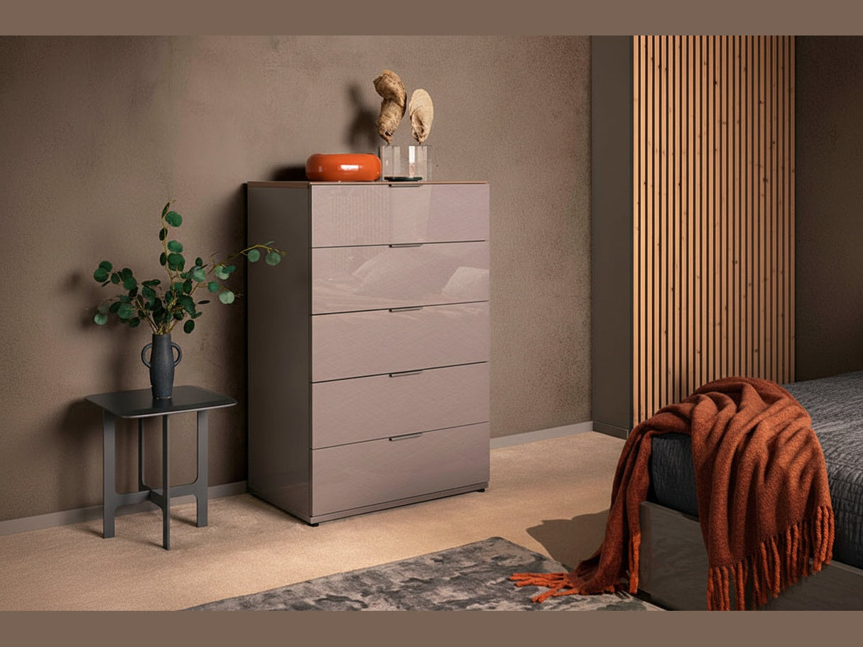 Fifth Avenue gray dresser with decorative items against a neutral wall
