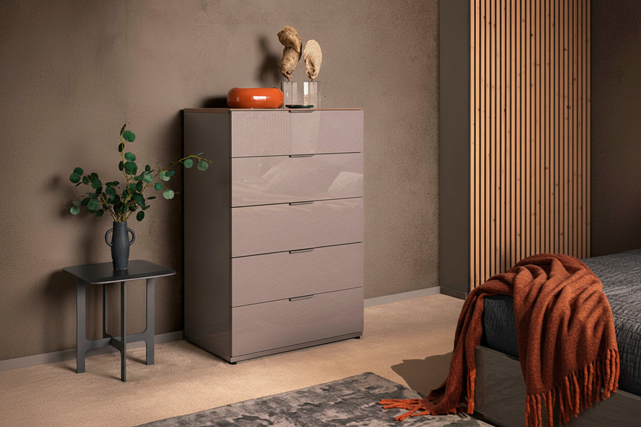 Fifth Avenue gray dresser with decorative items against a neutral wall