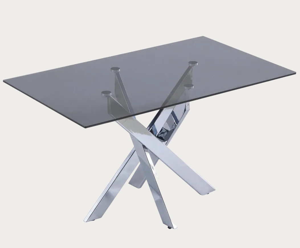 Genevieve modern glass dining table with metal legs on a white background