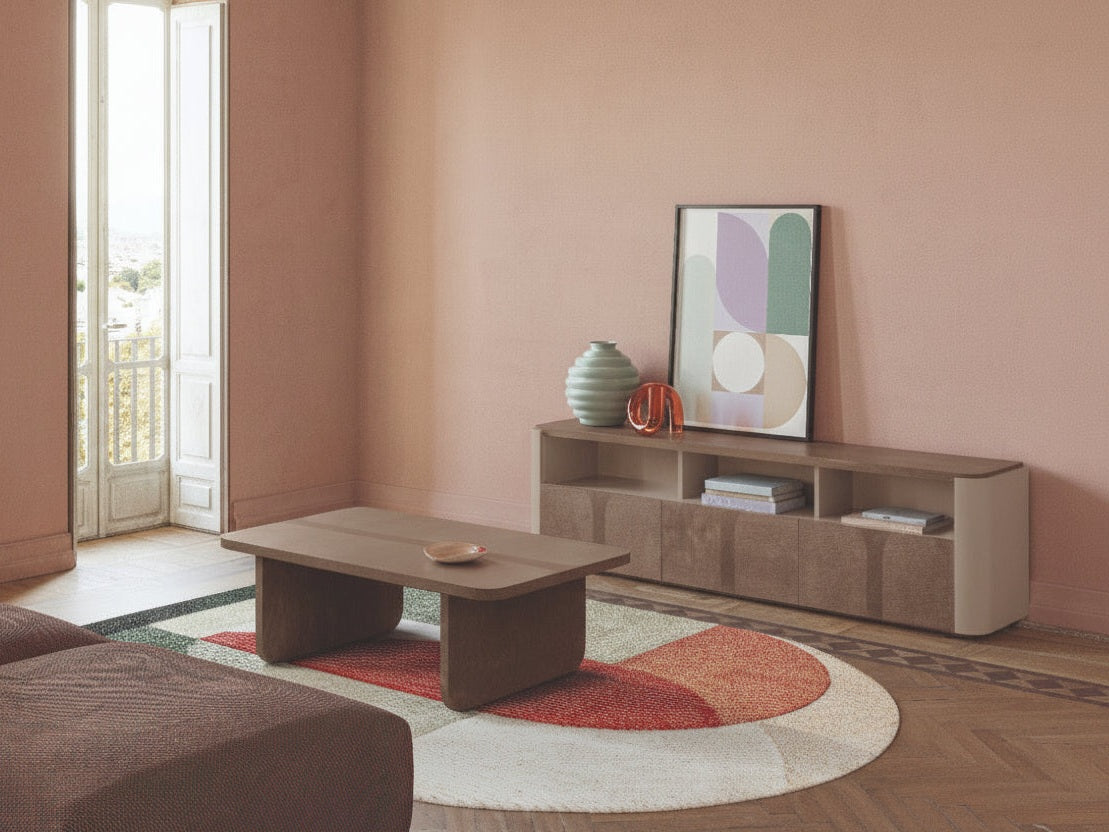 Hebe modern living room with a coffee table, sofa, and decorative items.