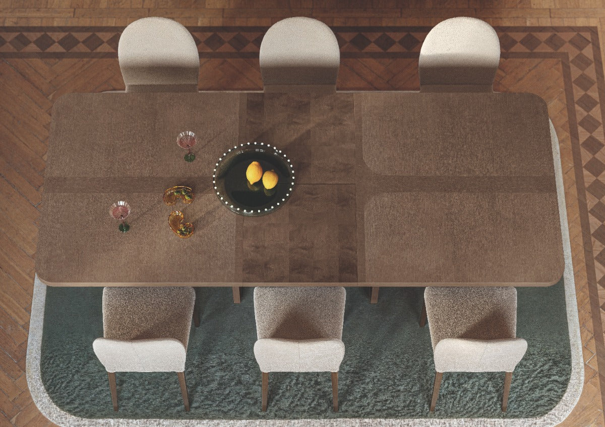 Hebe dining table with chairs on a patterned rug
