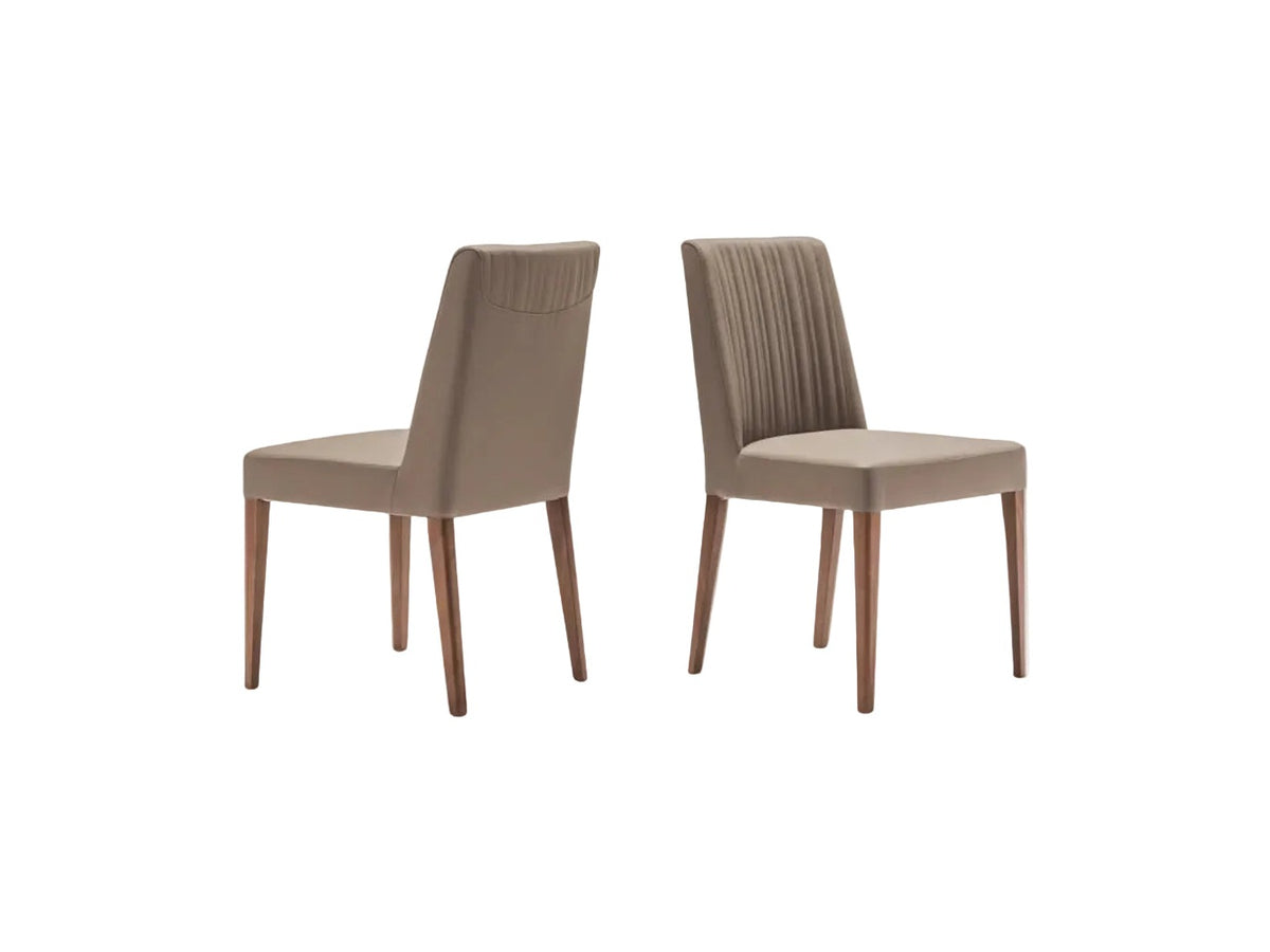Two brown Hera chair with wooden legs on a white background