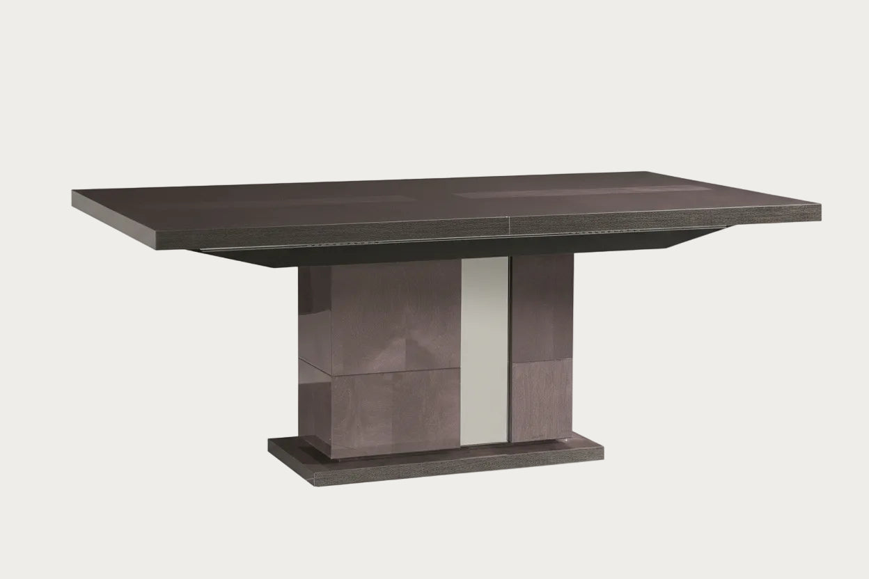 Heritage dark brown dining table on a white background