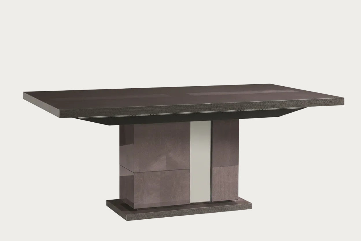 Heritage dark brown dining table on a white background