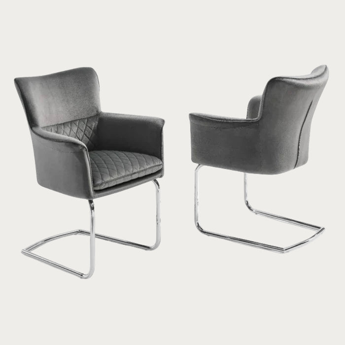 Loran armchair upholstered in Grey Velvet with chrome legs