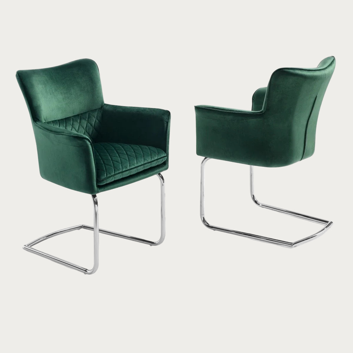 Loran armchair upholstered in green velvet with chrome legs