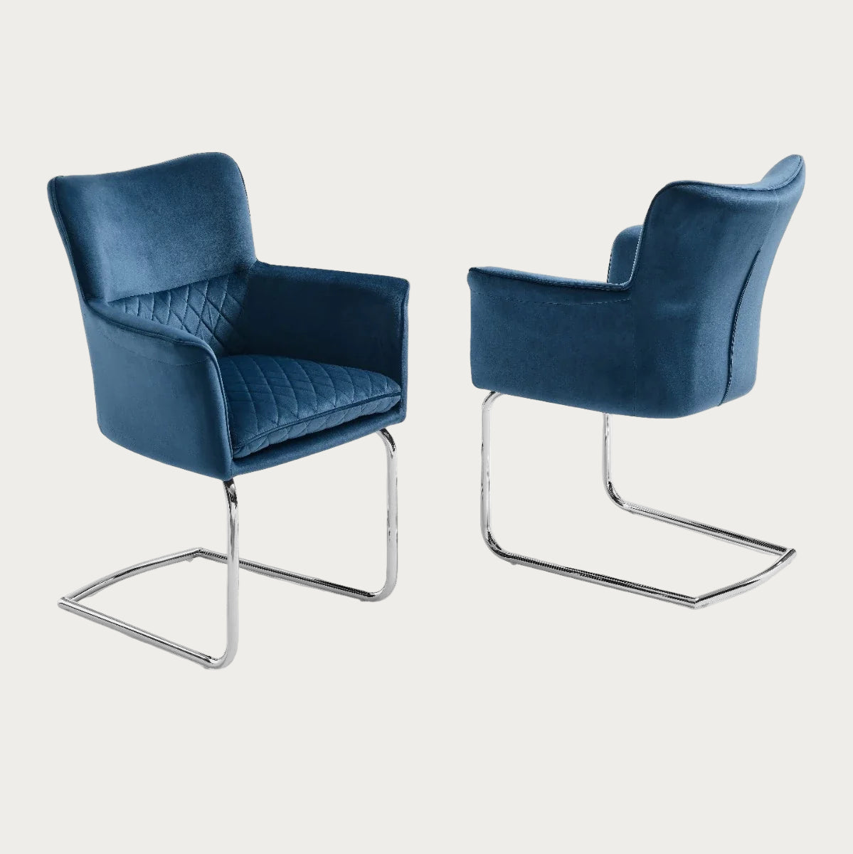 Loran armchair upholstered in Blue velvet with chrome legs