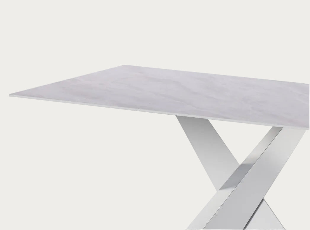 White dining table with a modern design on a white background