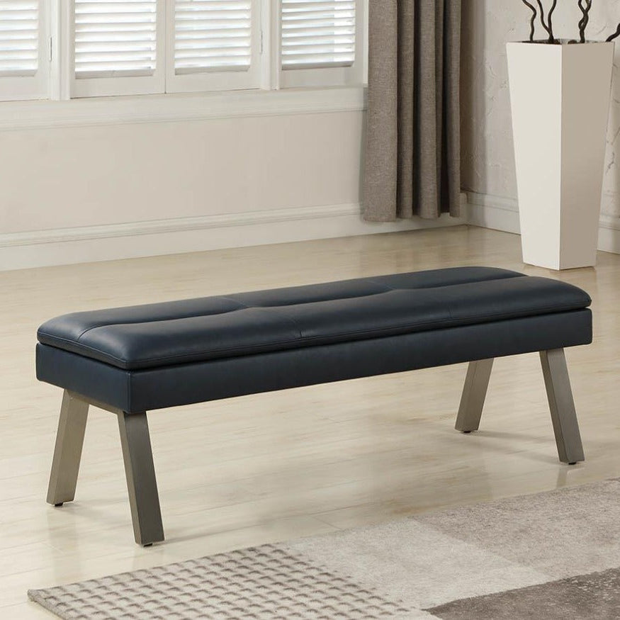 Jezebel bench in a room with light wood flooring and a window in the background.
