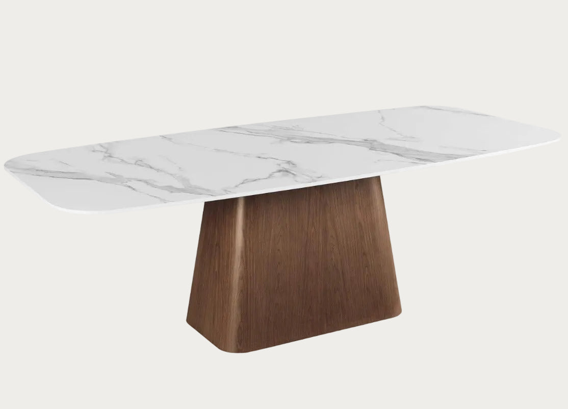 The Kenza dining table with marble top and wooden base.