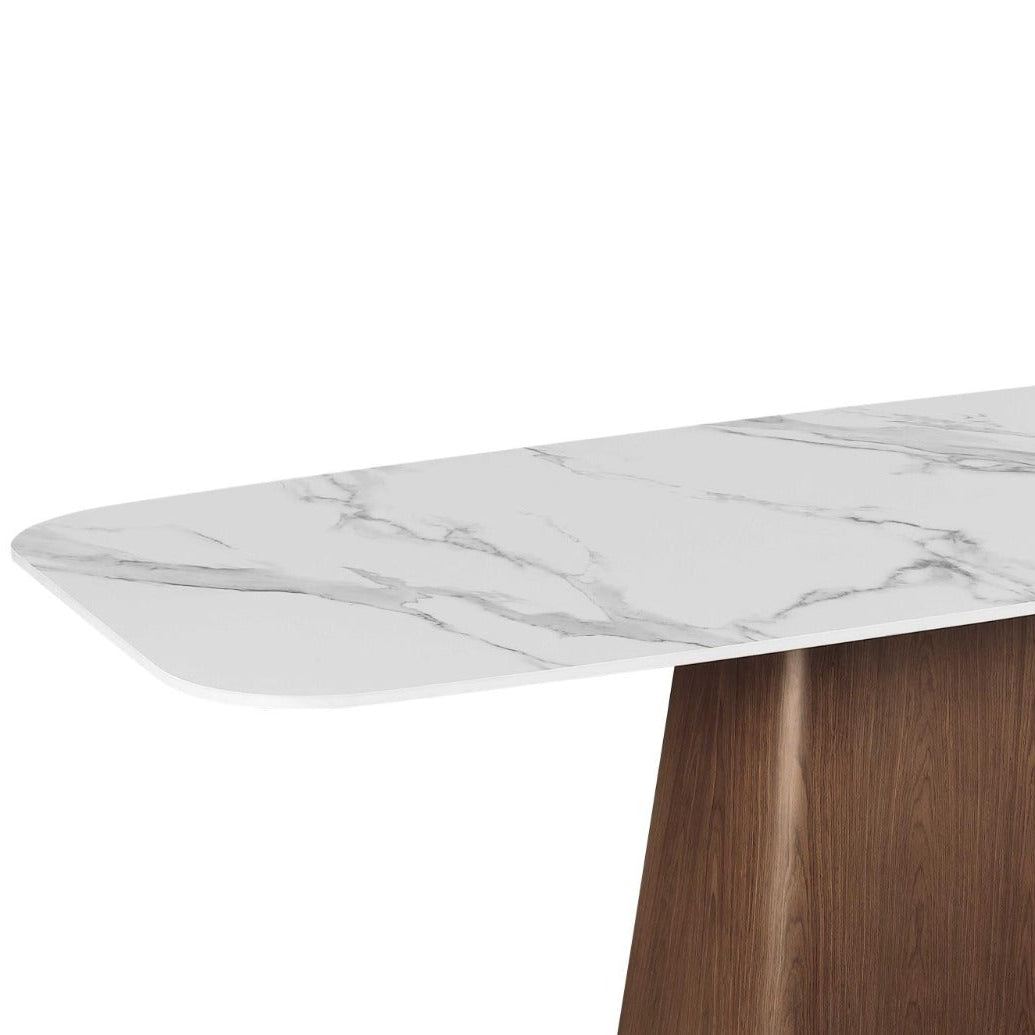 Marble-top table with wooden leg.