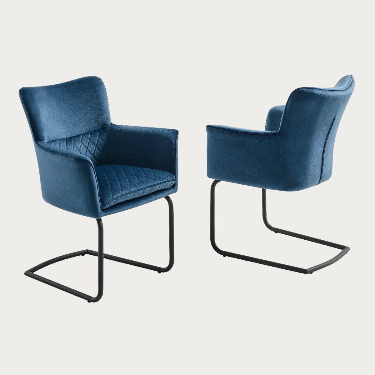Loran armchair upholstered in blue velvet with black legs