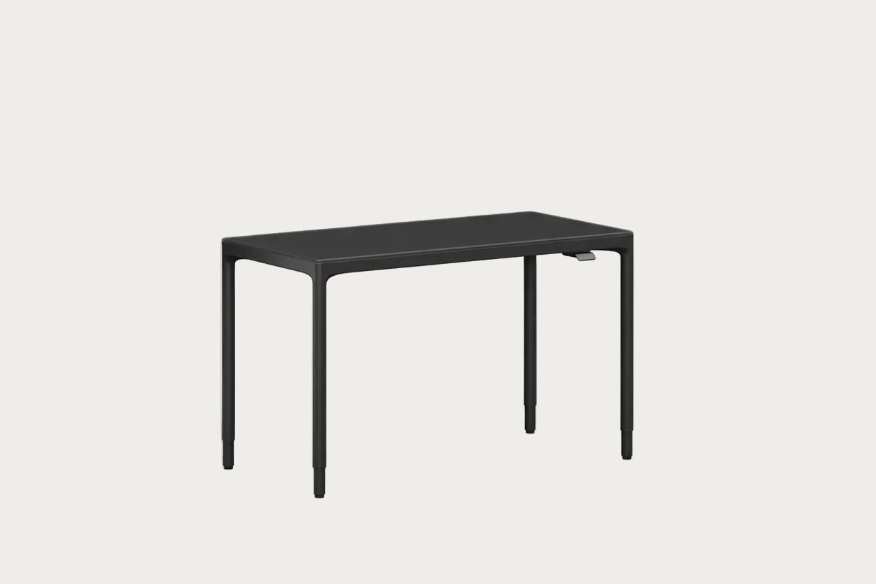 Luma compact Sit+Stand rectangular table on a white background.